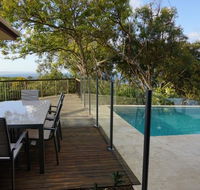 Scribbly Gums - Rainbow Beach Ocean-front spacious home with pool - Accommodation Nelson Bay