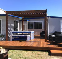 Shellharbour Beach Cottage - walk onto Patrolled beach with flags in summer - Accommodation Nelson Bay