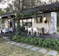 Absolute riverfront shipping container cabin - Accommodation Nelson Bay