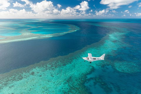 Great Barrier Reef Scenic Flight And Ocean Rafting Whitehaven Beach Day Trip - Accommodation Nelson Bay 3